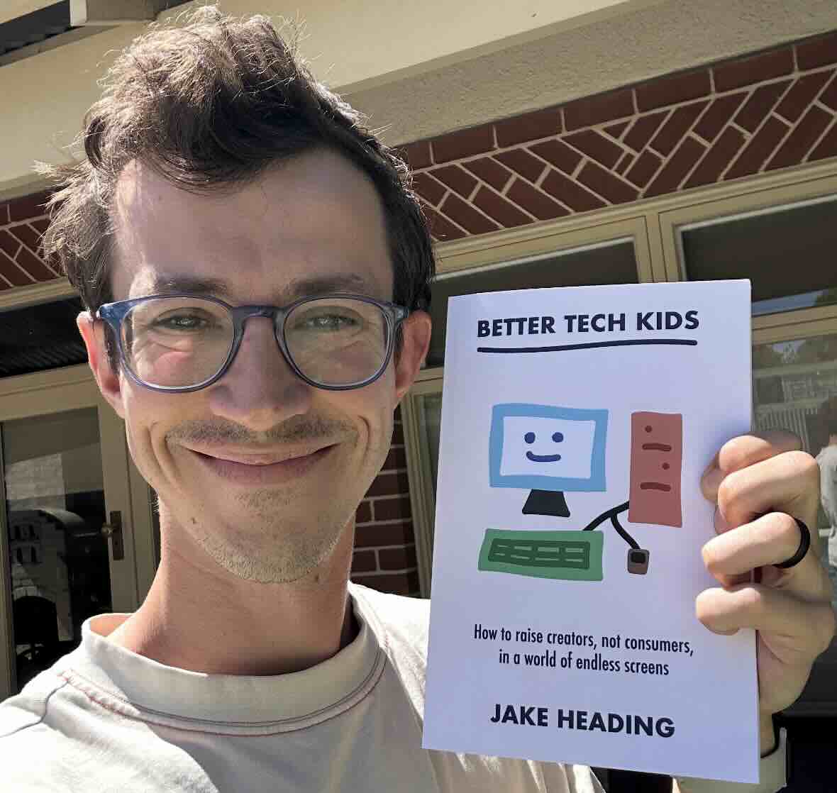 Jake Heading with a friendly, welcoming expression